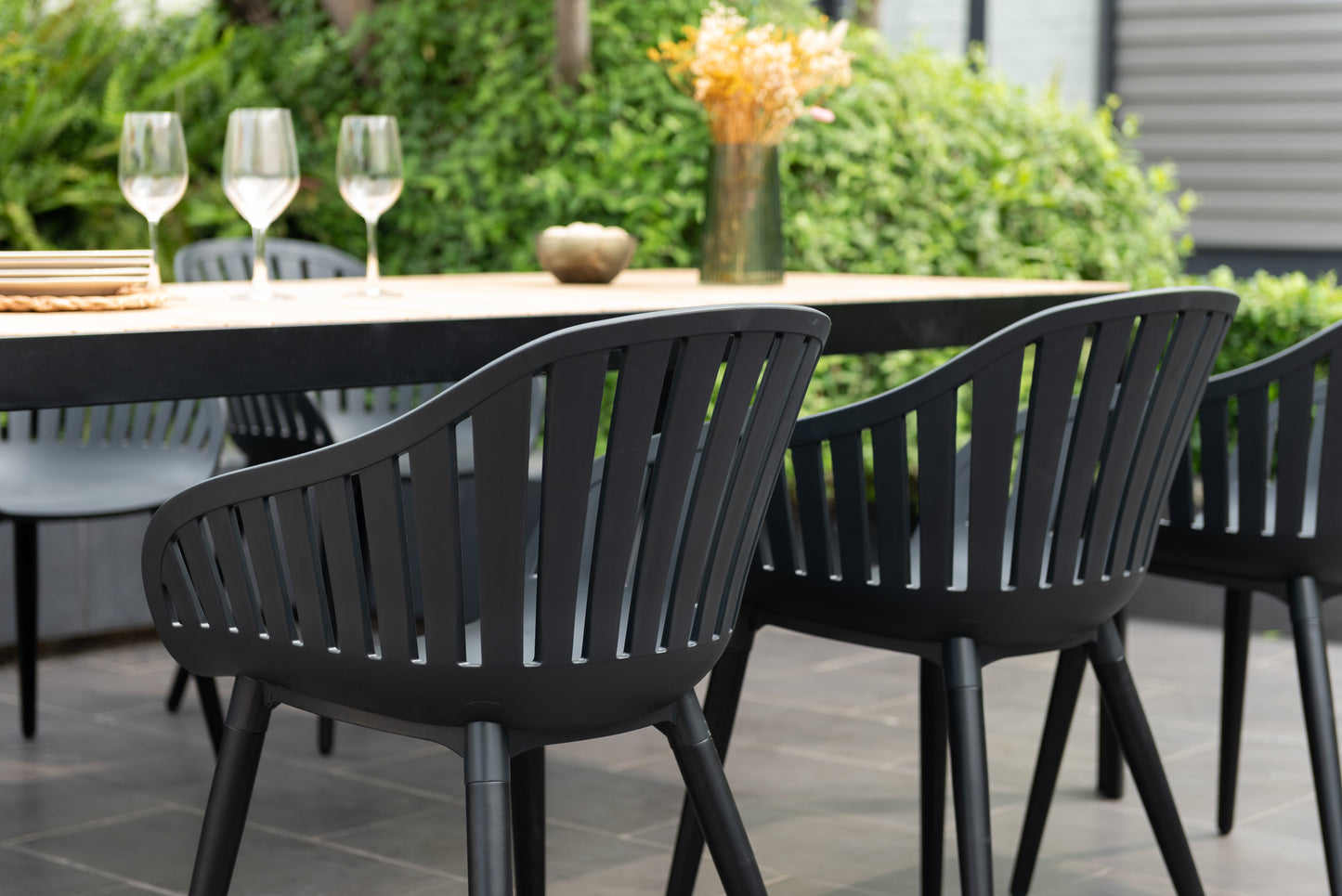 Portals Dark Rectangular Teak Table and 6 Nassau Black Aluminum Dining Set